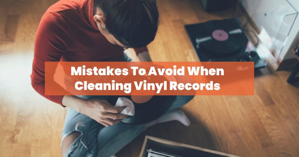 a woman cleaning vinyl record
