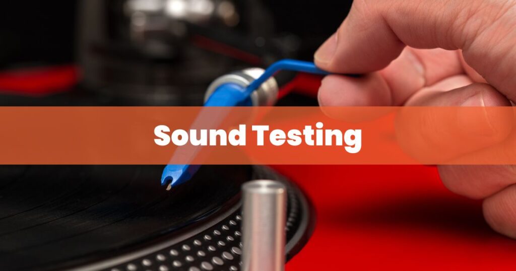 man testing record player sound